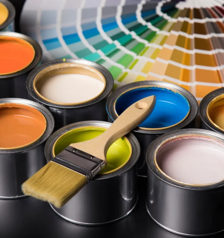 Paint cans with a brush